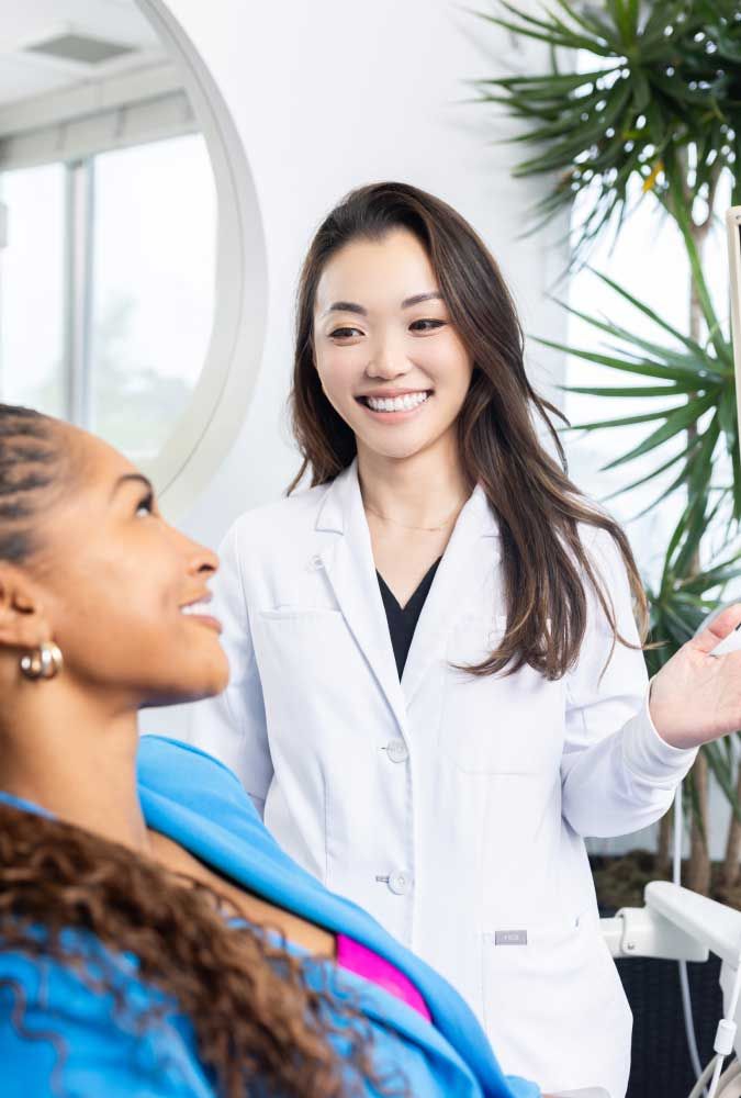 marina del rey dentist smiling with patient model