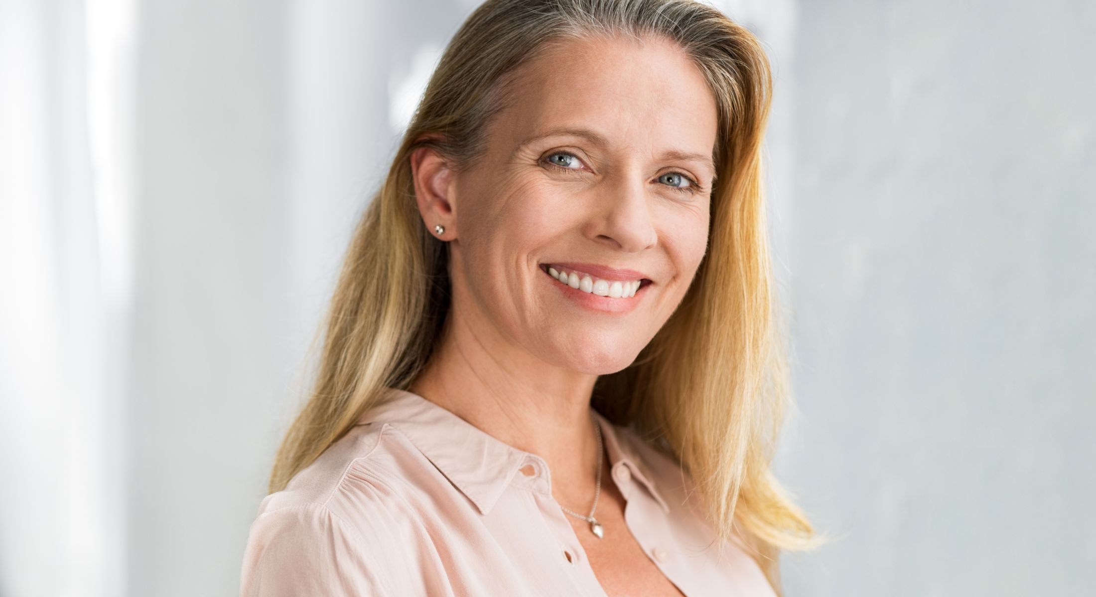 marina del rey dental implants model with blonde hair